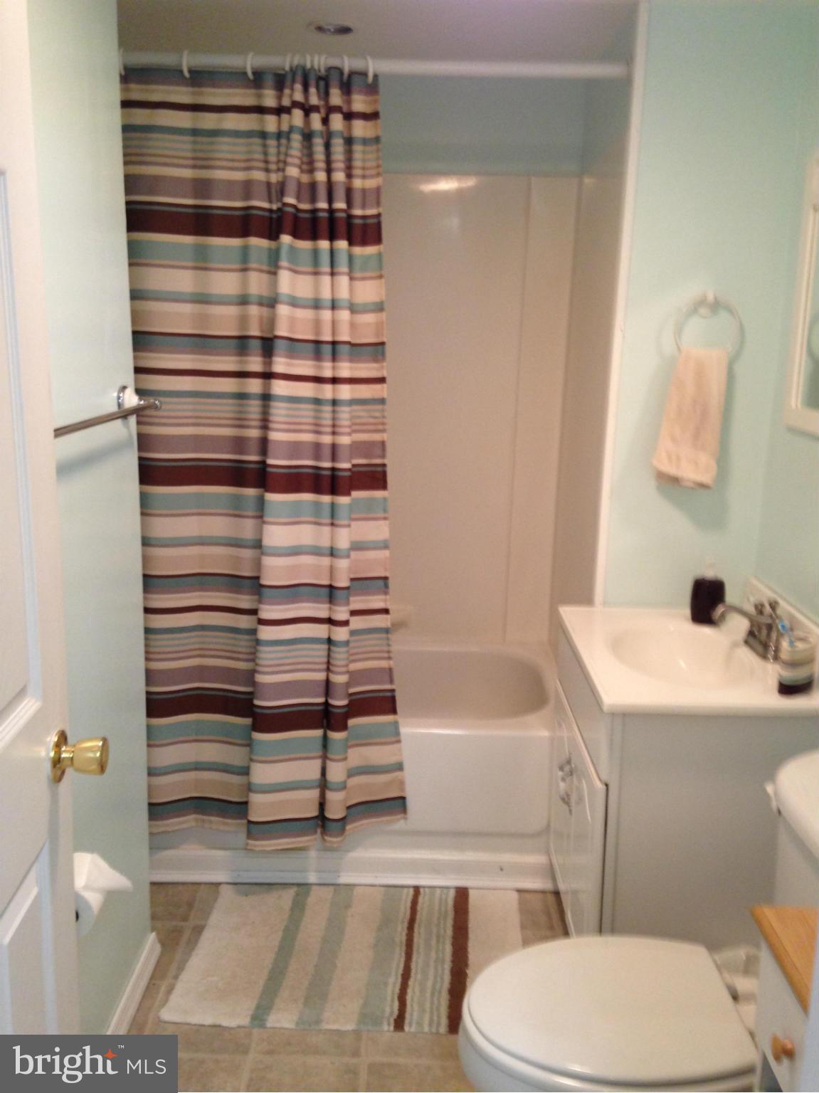 1355 Jewell Road Dunkirk, MD 20754 - Photo 27 of 30 a bathroom with a sink toilet and shower