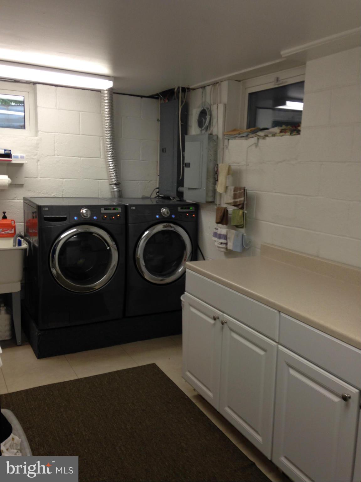 1355 Jewell Road Dunkirk, MD 20754 - Photo 29 of 30 a utility room with sink dryer and washer