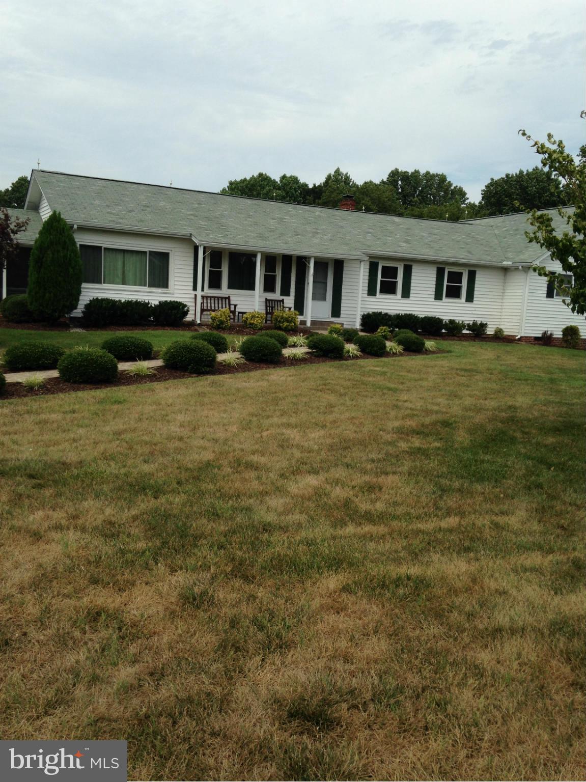 1355 Jewell Road Dunkirk, MD 20754 - Photo 4 of 30 a front view of a house with a yard