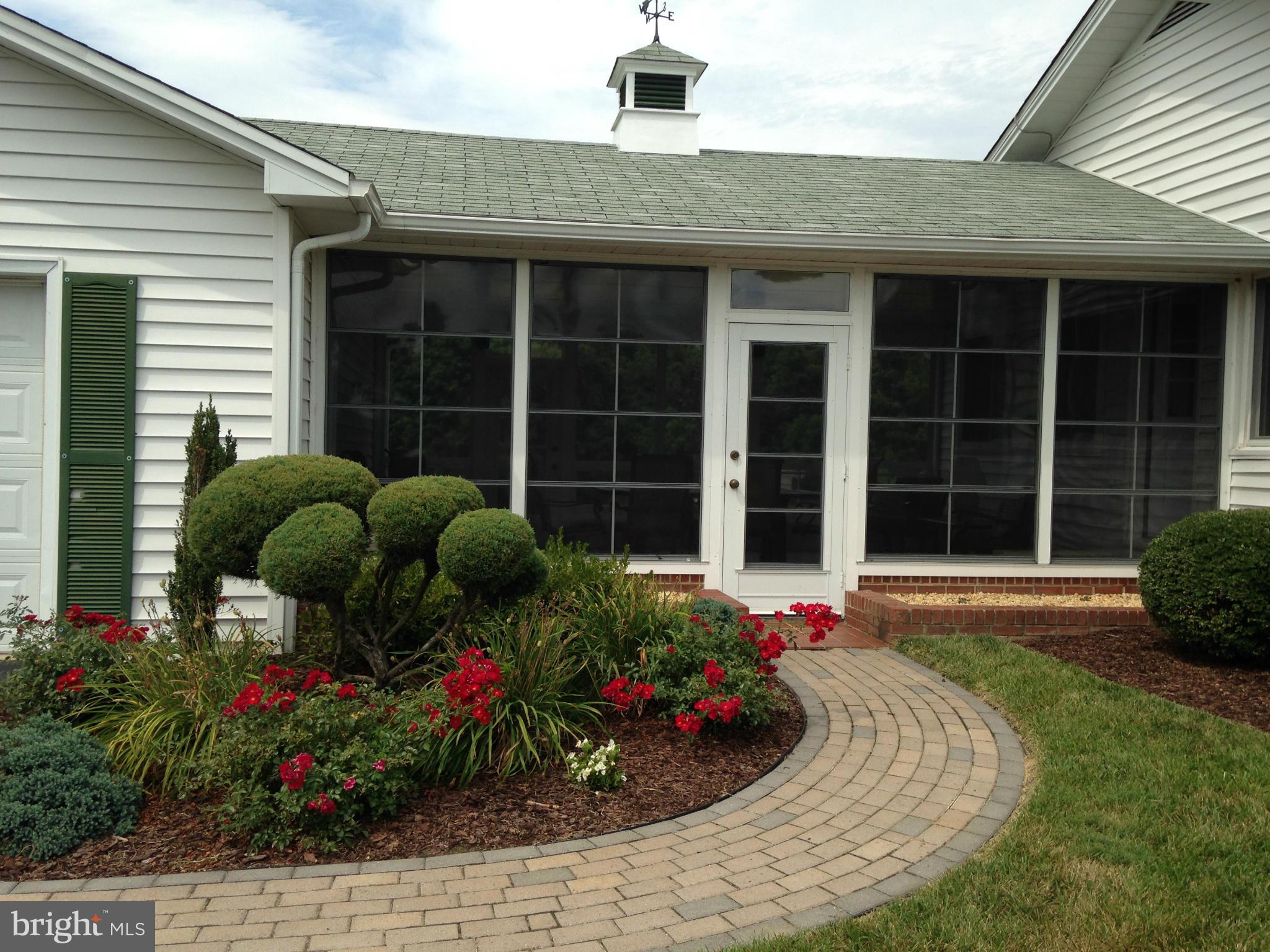 1355 Jewell Road Dunkirk, MD 20754 - Photo 5 of 30 a front view of a house with a yard and potted plants