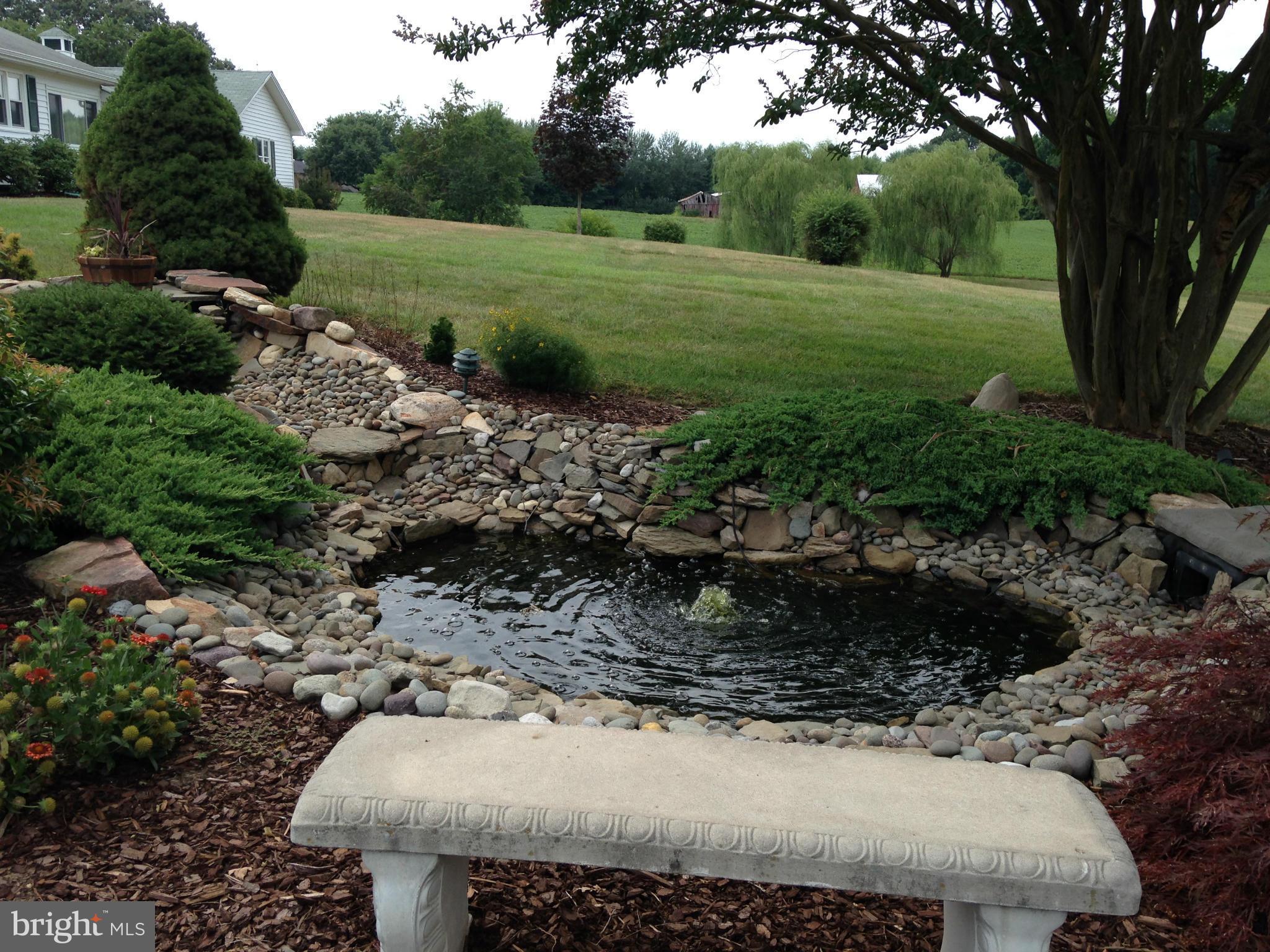 1355 Jewell Road Dunkirk, MD 20754 - Photo 7 of 30 a view of a garden with a tree