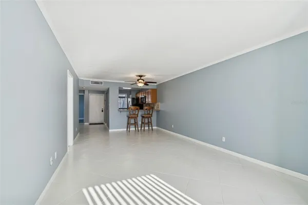 a kitchen with stainless steel appliances granite countertop a refrigerator stove and sink