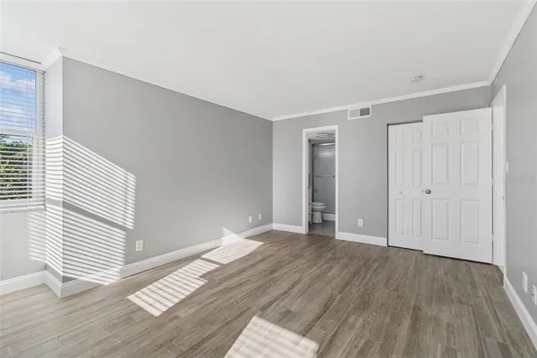 a view of an empty room and window