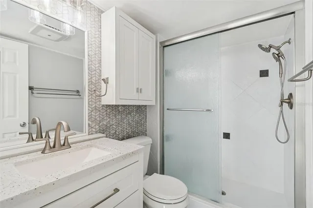 a view of a swimming pool with a sitting space