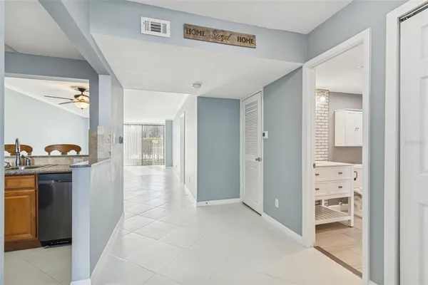 a view of an empty room with a window