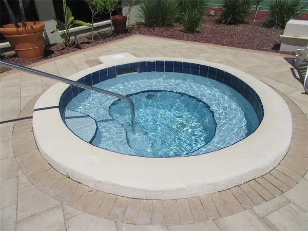 a kitchen with a table and chairs in it