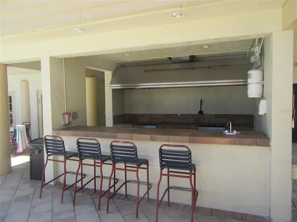 a view of the house with a patio