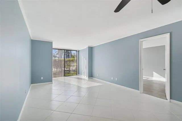 a view of a room with large windows