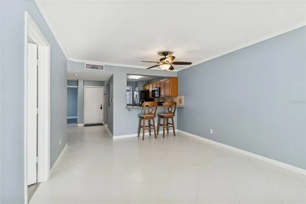 a view of a room with windows