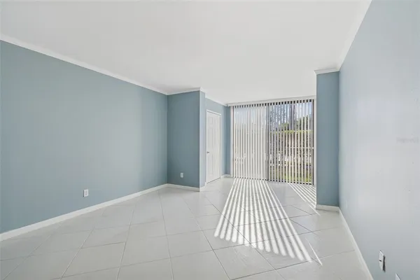 a view of a room with large windows