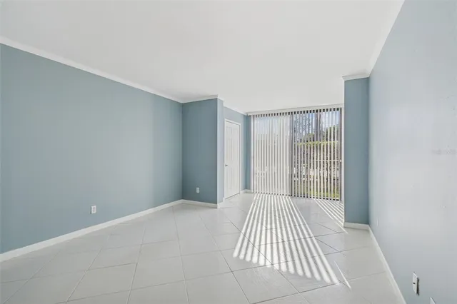 a kitchen with a sink a stove a refrigerator and cabinets