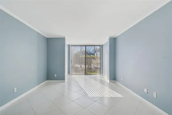 a view of an empty room with a window