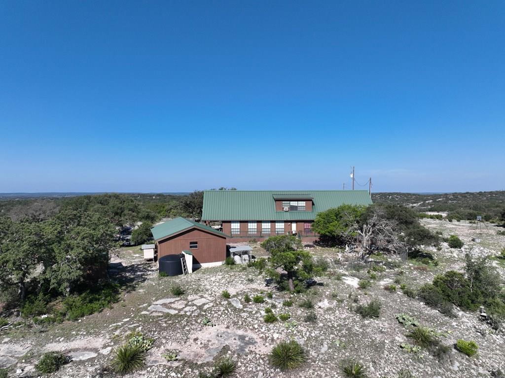 48 SD 14070 Rocksprings, TX 78880 - Photo 2 of 11 an aerial view of a house