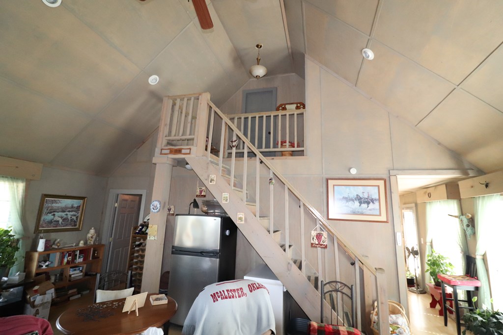 48 SD 14070 Rocksprings, TX 78880 - Photo 8 of 11 a view of staircase with lots of frames on wall and windows