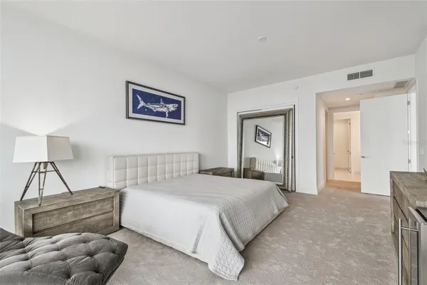 a view of storage and utility room with wooden floor