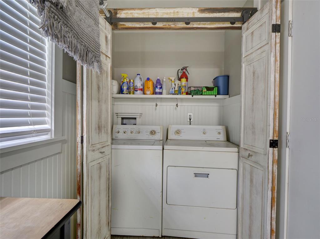 37149 Grays Airport Road Lady Lake, FL 32159 - Photo 16 of 36 a utility room with dryer and washer