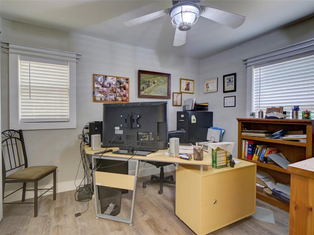 37149 Grays Airport Road Lady Lake, FL 32159 - Photo 17 of 36 a living room with fireplace furniture and a window