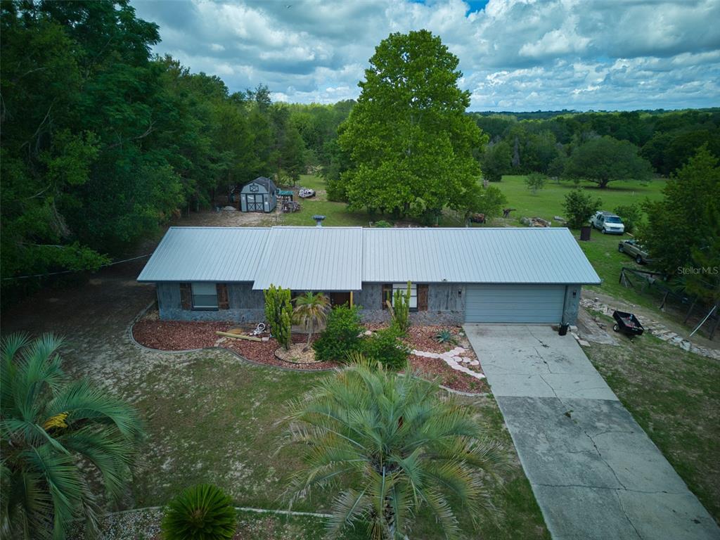 37149 Grays Airport Road Lady Lake, FL 32159 - Photo 20 of 36 an aerial view of a house