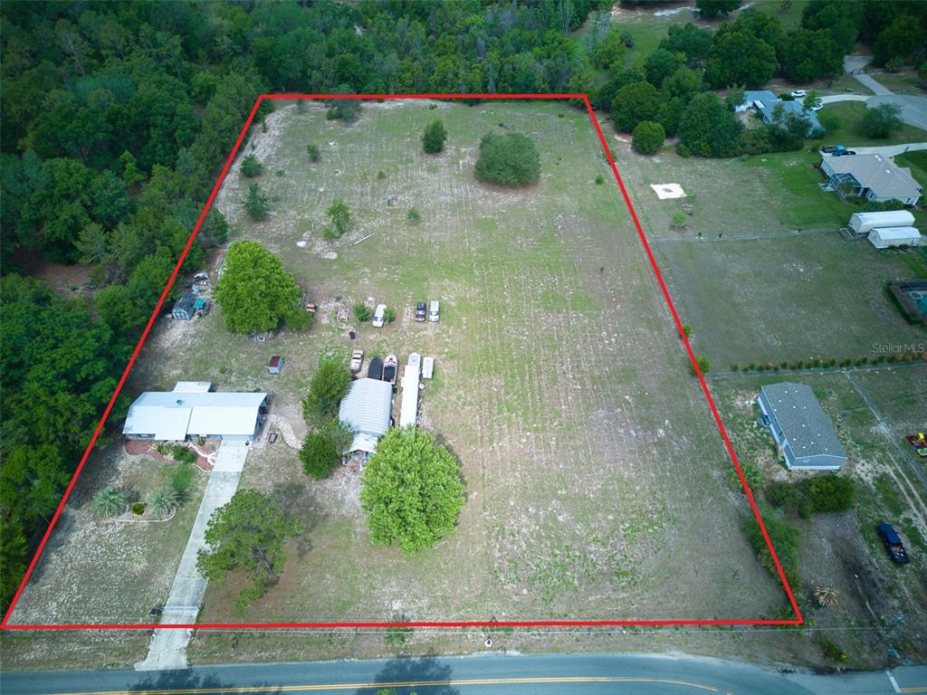 37149 Grays Airport Road Lady Lake, FL 32159 - Photo 32 of 36 an aerial view of a house