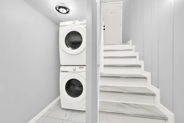 a utility room with dryer and washer