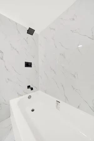 a bathroom with a bathtub