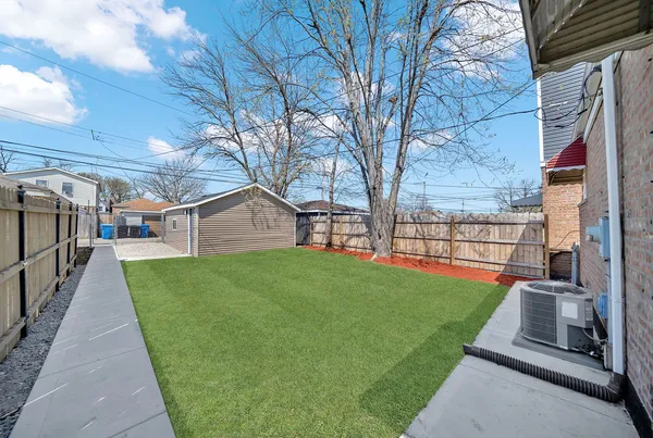 a house view with garden space