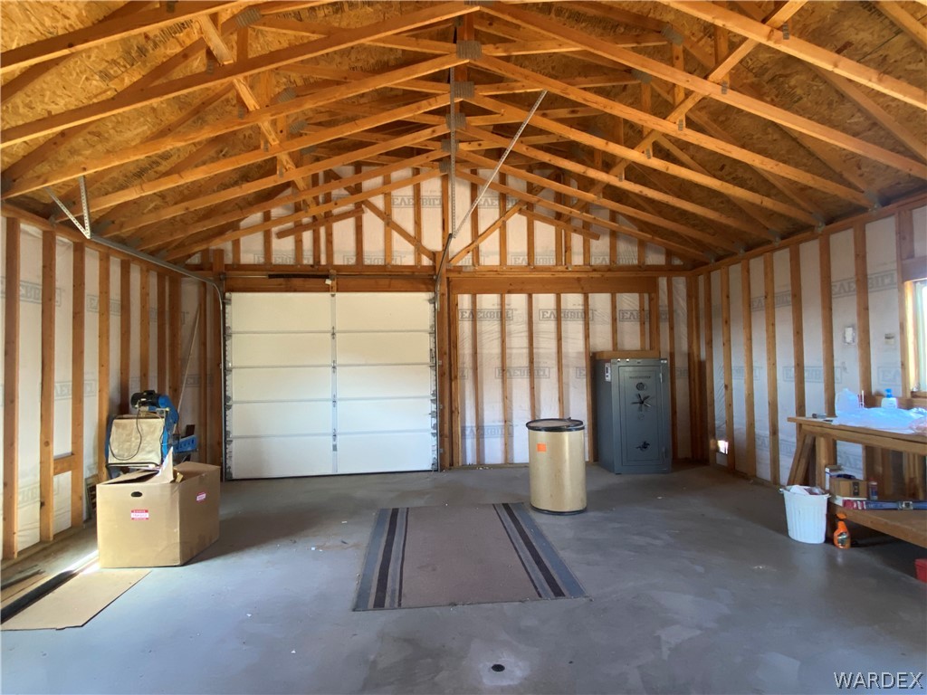 9095 Elliott Ridge Road Kingman, AZ 86401 - Photo 12 of 54 a view of an empty room with a window