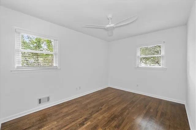 a view of a room that has a window in it