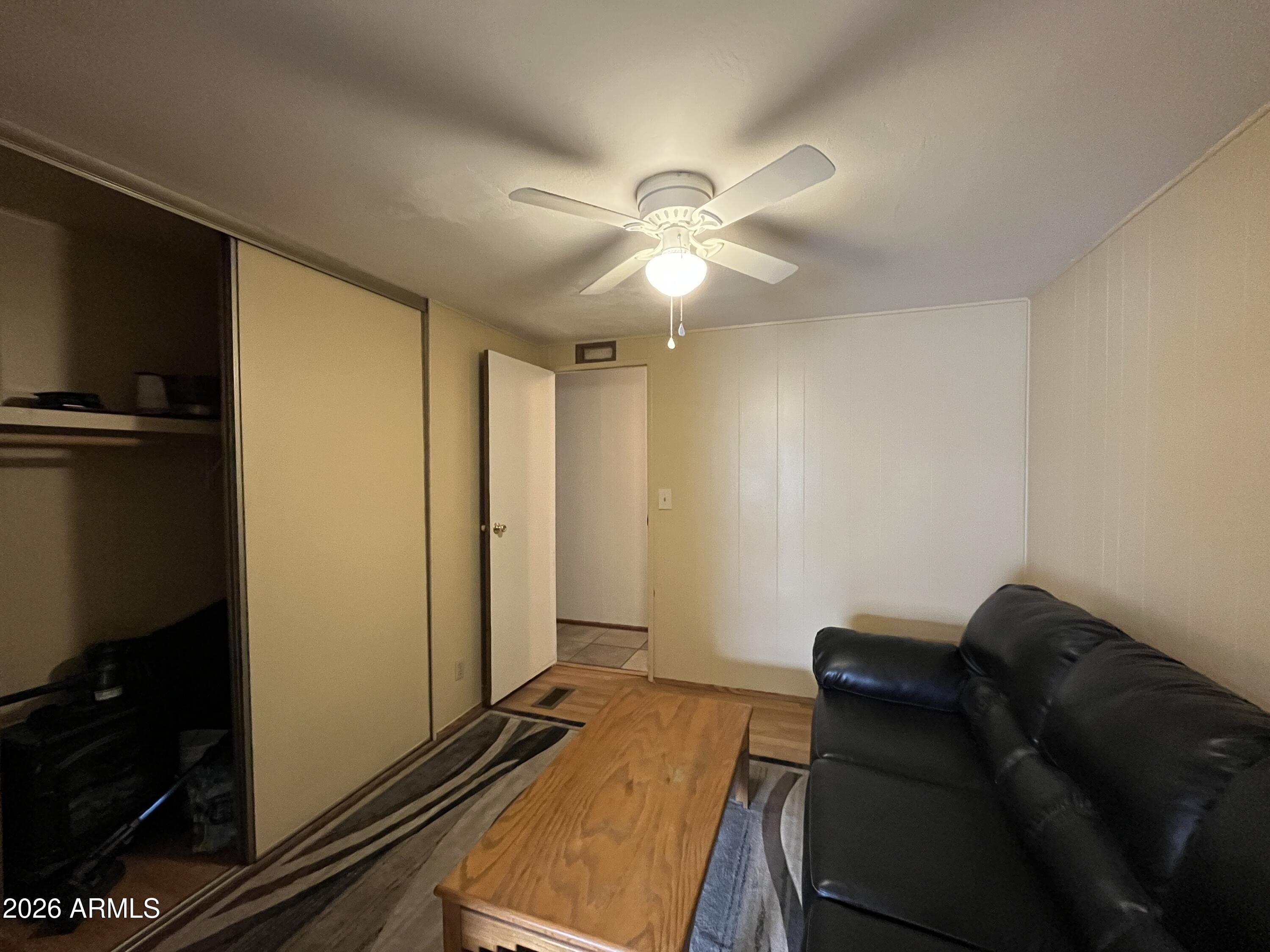 9302 East Broadway Road, Unit 179 Mesa, AZ 85208 - Photo 20 of 54 a living room with furniture and a window