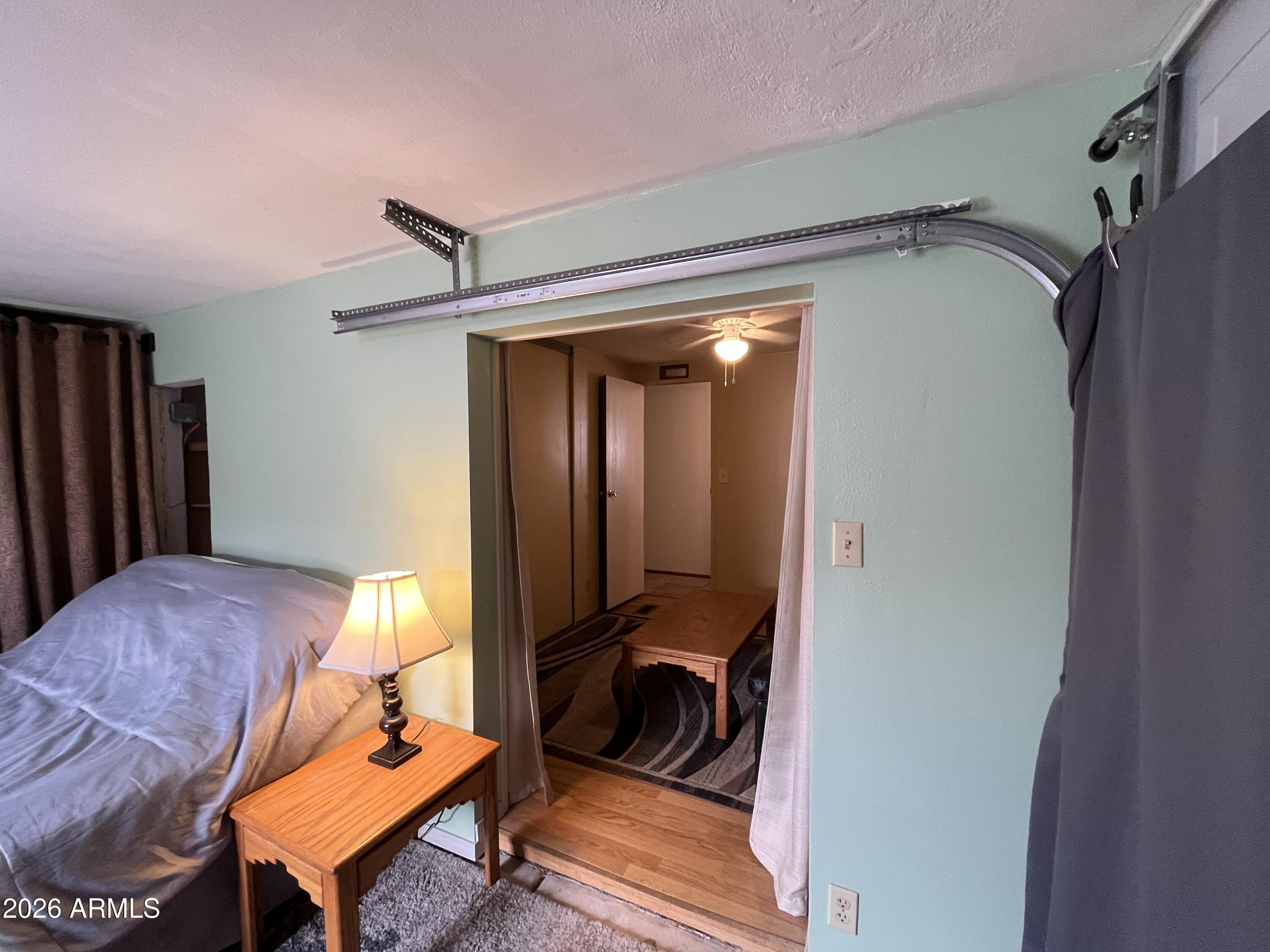 9302 East Broadway Road, Unit 179 Mesa, AZ 85208 - Photo 24 of 54 a bedroom with bed and a window