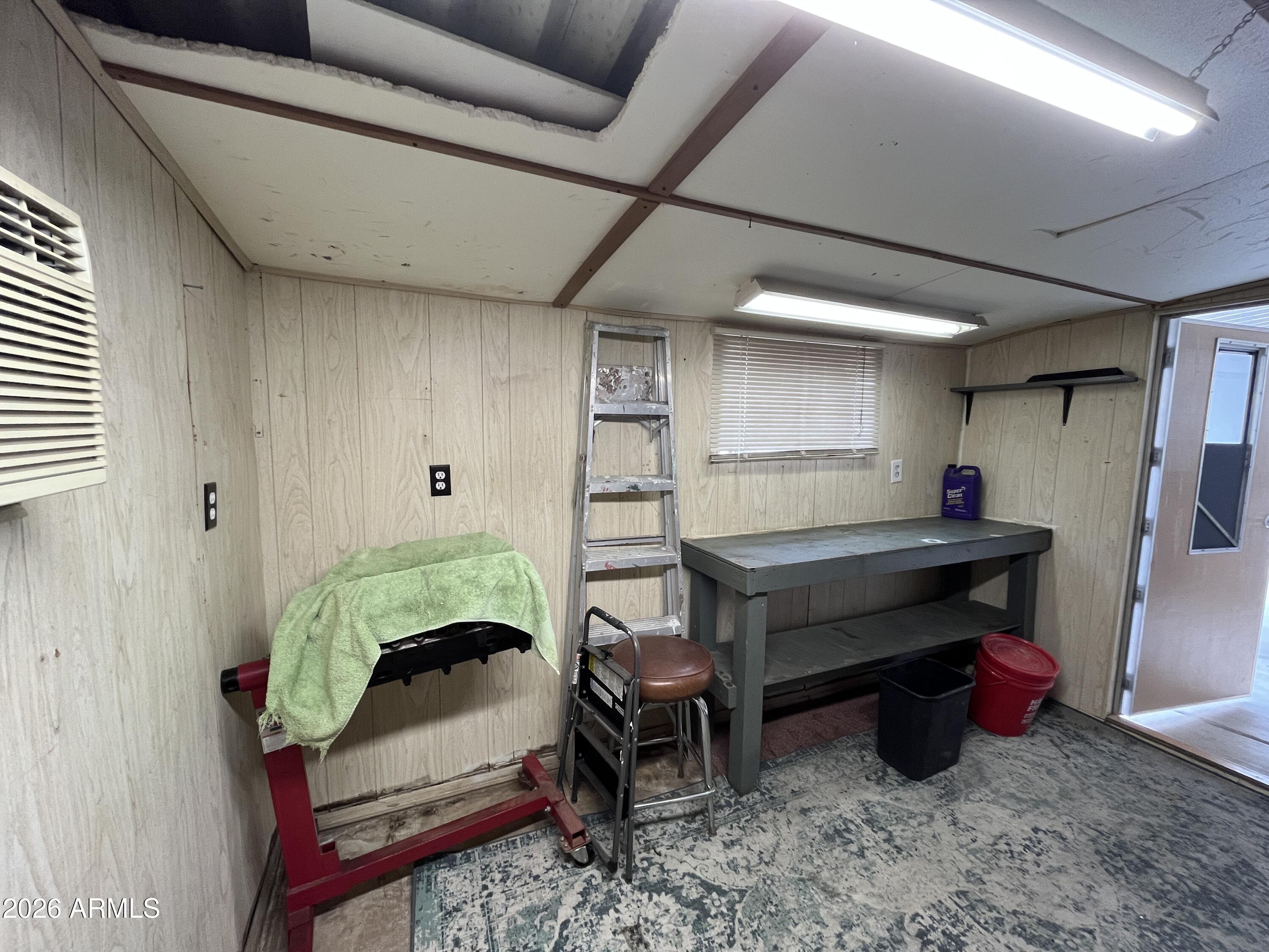 9302 East Broadway Road, Unit 179 Mesa, AZ 85208 - Photo 43 of 54 a room with furniture