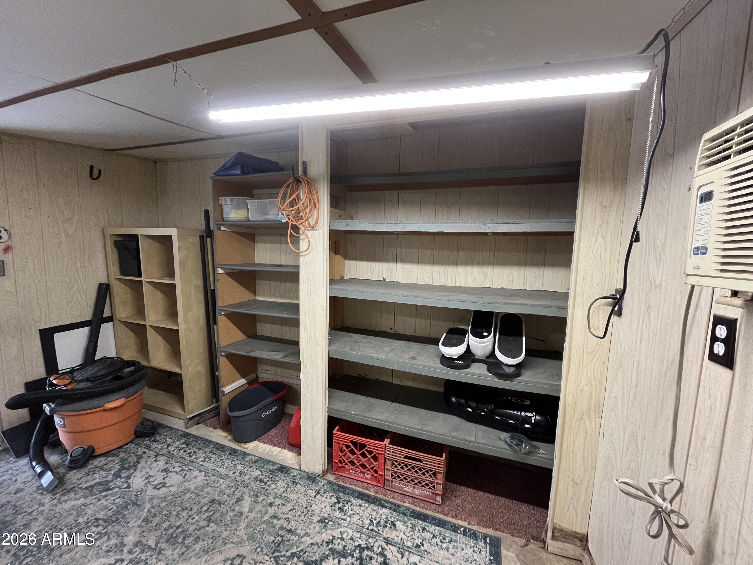 9302 East Broadway Road, Unit 179 Mesa, AZ 85208 - Photo 44 of 54 a kitchen with stainless steel appliances granite countertop a stove and a refrigerator