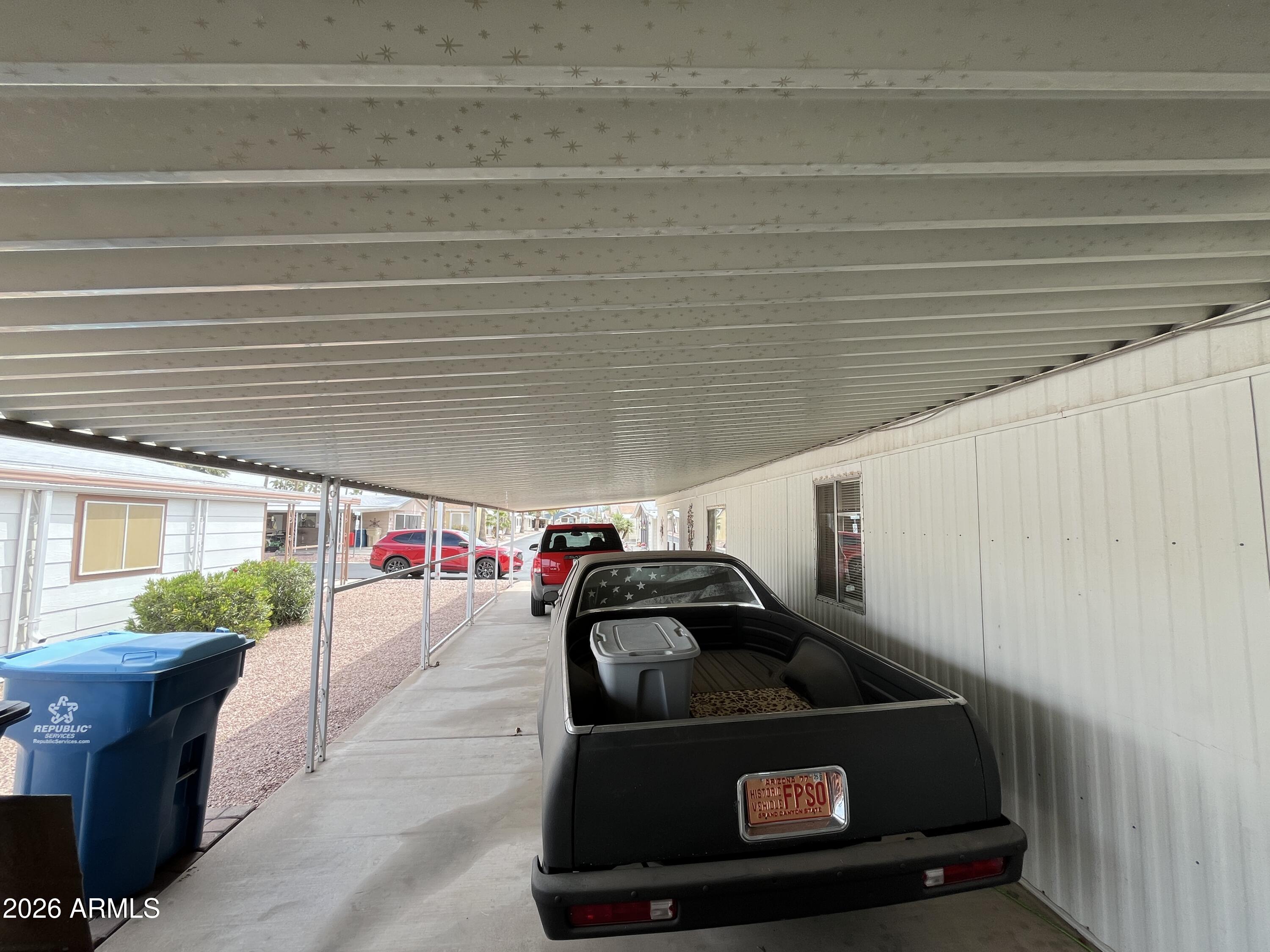 9302 East Broadway Road, Unit 179 Mesa, AZ 85208 - Photo 45 of 54 a view of a garage