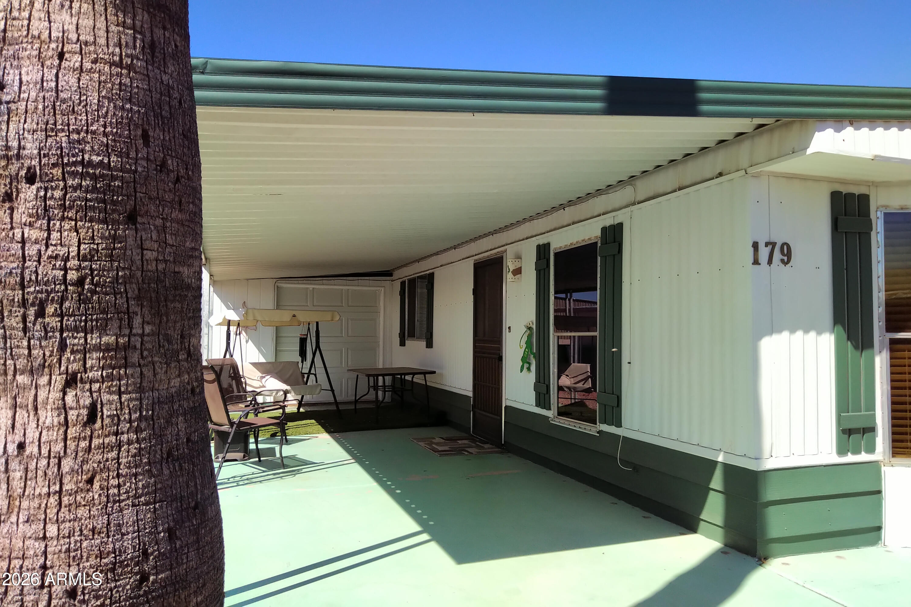 9302 East Broadway Road, Unit 179 Mesa, AZ 85208 - Photo 53 of 54 a living room with furniture