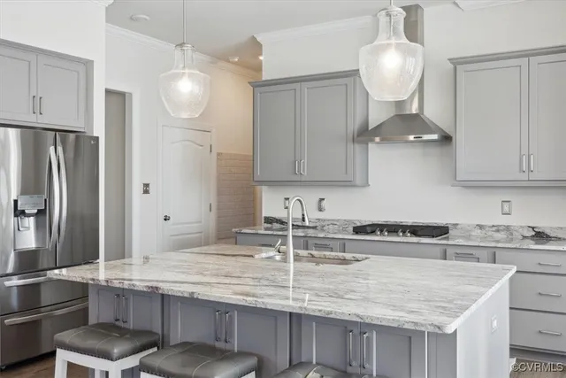 a view of a kitchen and dining room with wooden floor
