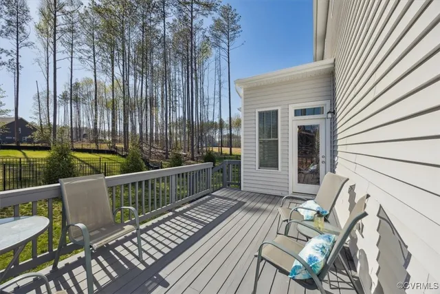 a bedroom with a bed and a television