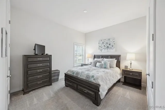 a bathroom with a sink a toilet a mirror a vanity and shower