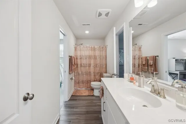 a view of a livingroom with space and a flat screen tv