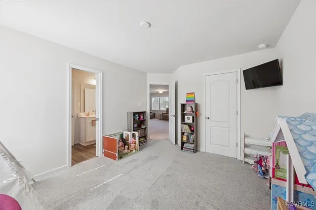 a kitchen with a stove and a refrigerator
