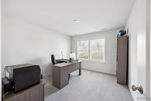 a bed room with a bed and window