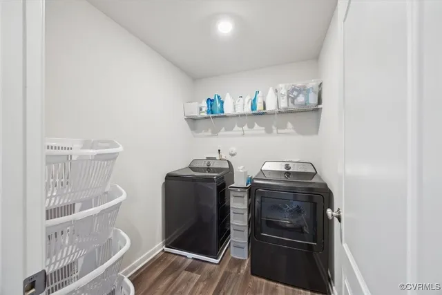 a spacious bedroom with a bed and a flat screen tv