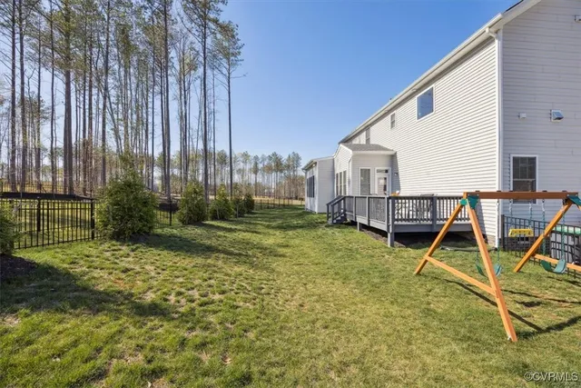 an aerial view of a swimming pool patio and outdoor seating
