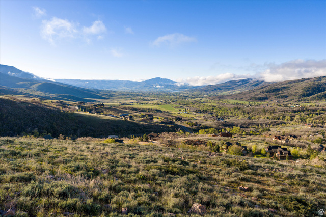6975 North Durfee Way, Unit 20 Eden, UT 84310 - Photo 7 of 15 Expansive mountain landscape featuring a valley with scattered residential properties