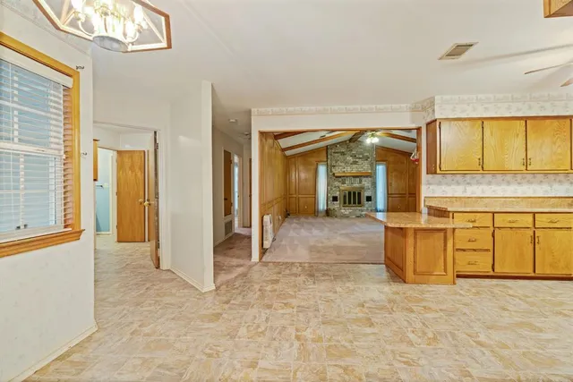 a view of a bathroom with a tub and mirror view
