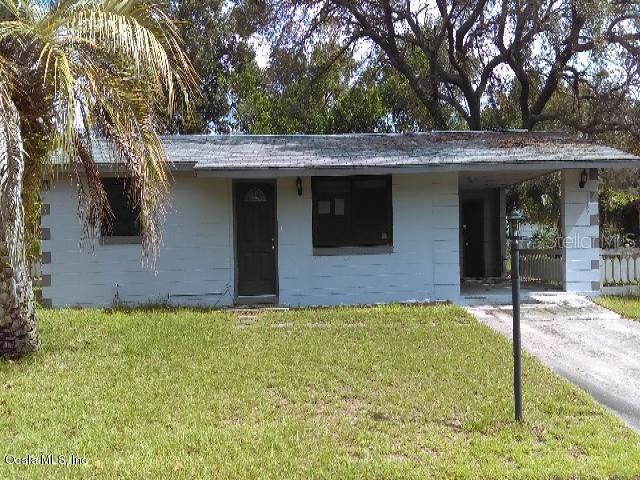 3689 Southwest 147 Lane Road Ocala, FL 34473 - Photo 1 of 1 a view of a house with a outdoor space