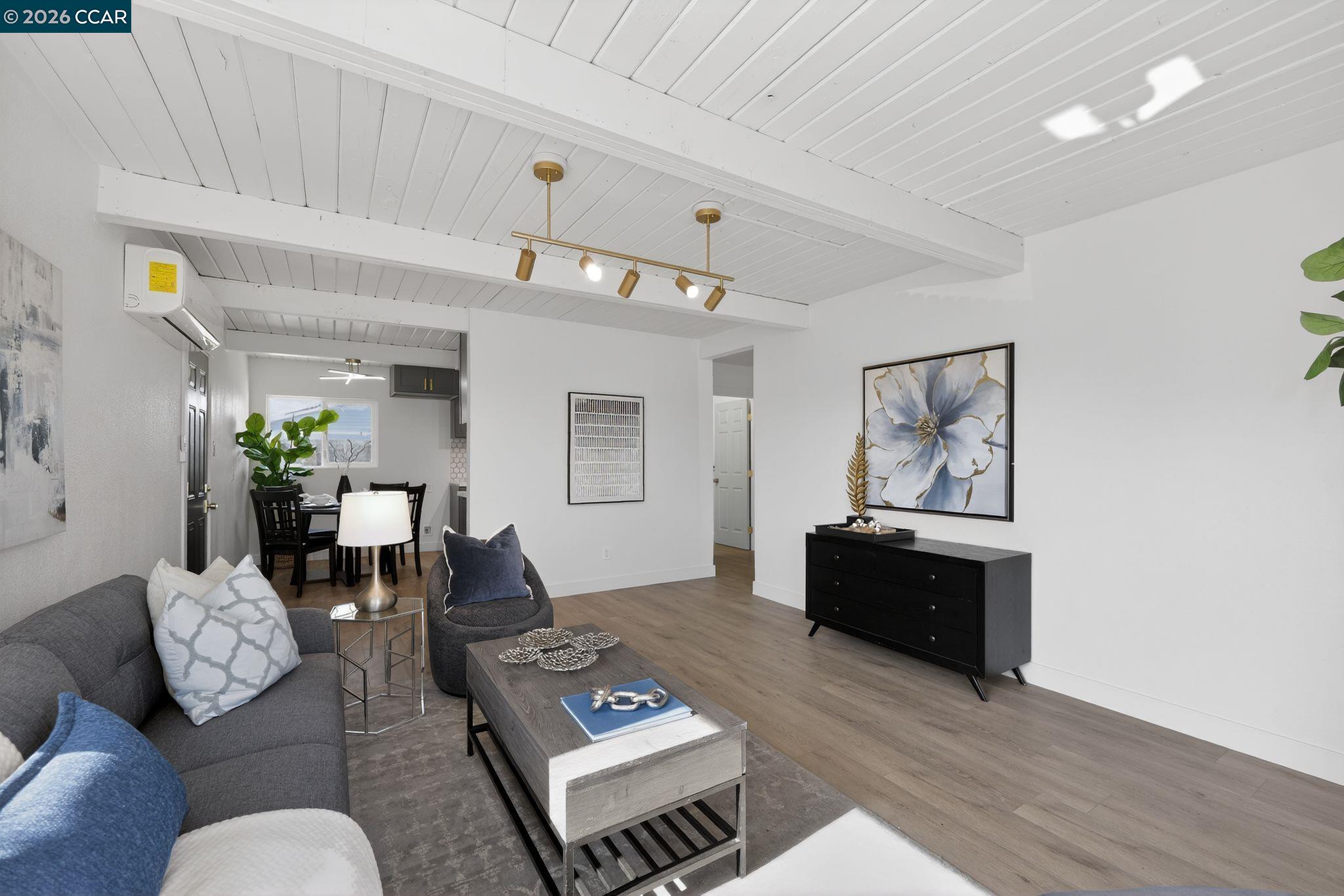 87 Bay Drive Bay Point, CA 94565 - Photo 6 of 22 a living room with furniture and wooden floor