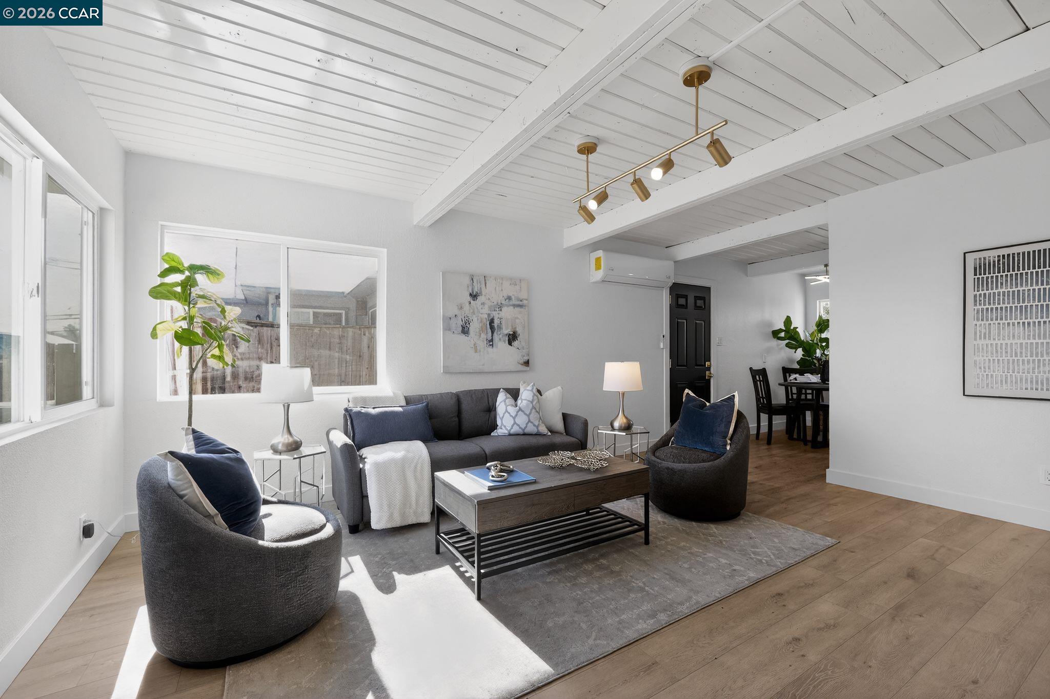 87 Bay Drive Bay Point, CA 94565 - Photo 8 of 22 a living room with furniture and wooden floor