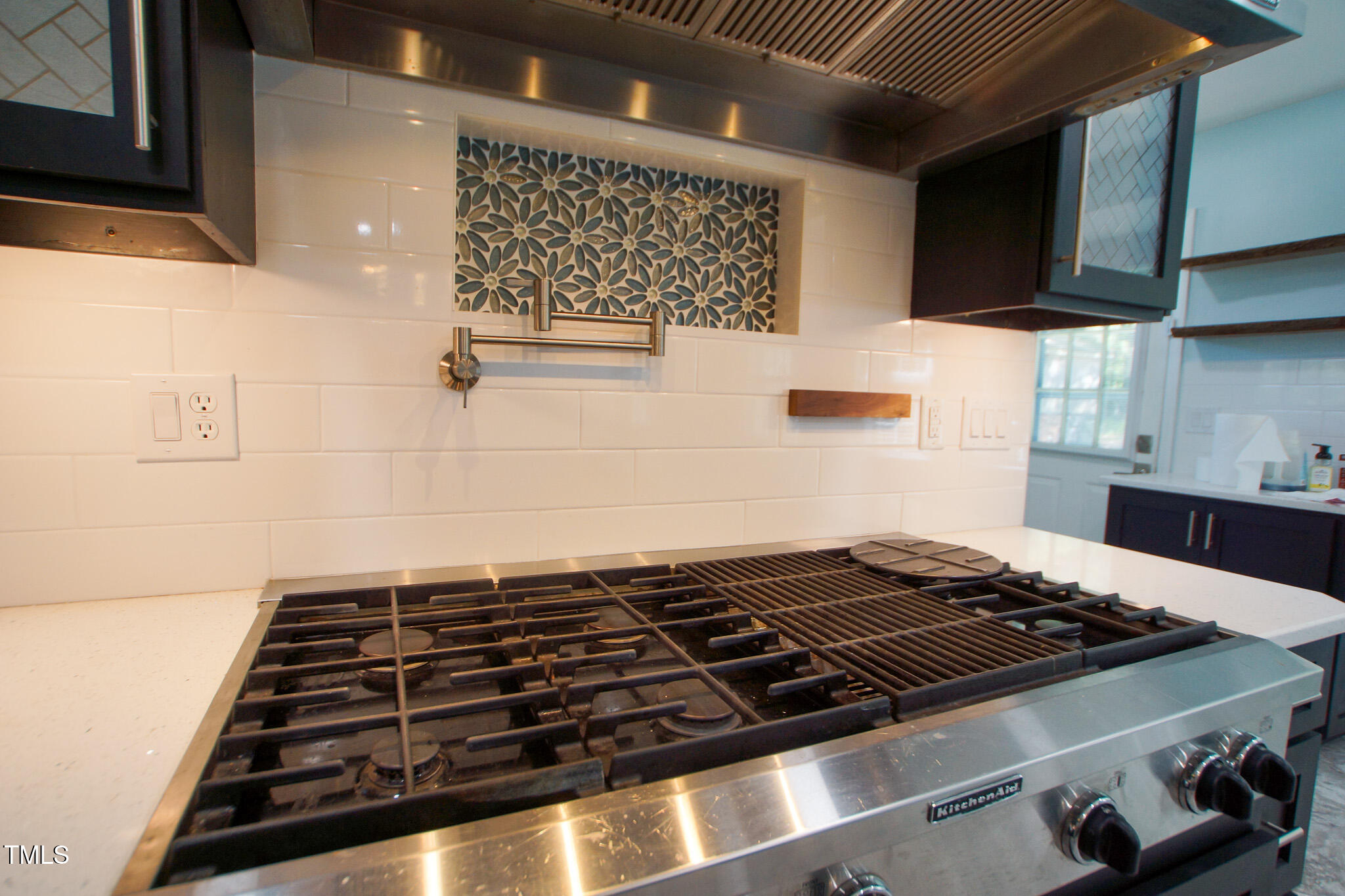 5705 Katha Drive Holly Springs, NC 27540 - Photo 14 of 27 a stove top oven sitting inside of a kitchen