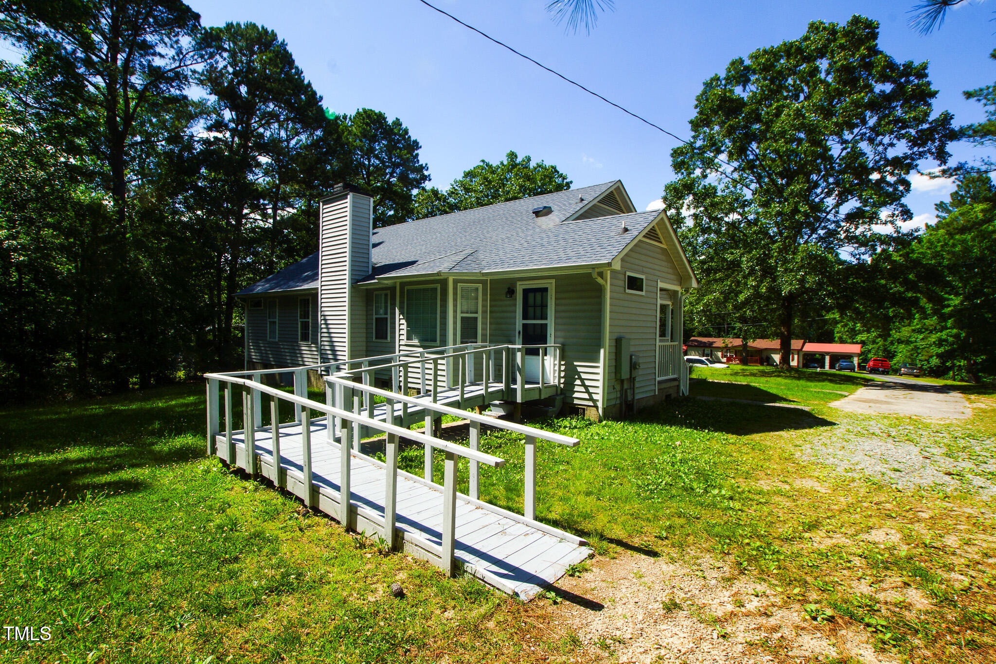 5705 Katha Drive Holly Springs, NC 27540 - Photo 3 of 27 a view of house with a backyard