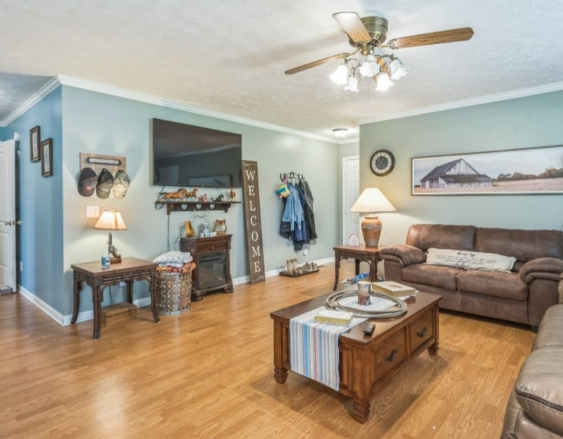 5312 West Trimble Road Milton, TN 37118 - Photo 17 of 42 a living room with furniture and a flat screen tv